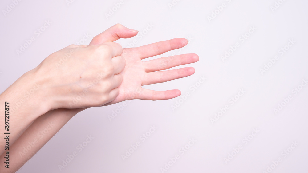 Parkinson's disease symptoms. Close up of tremor (shaking) hands of Middle-aged women patient with Parkinson's disease. Mental health and neurological disorders.