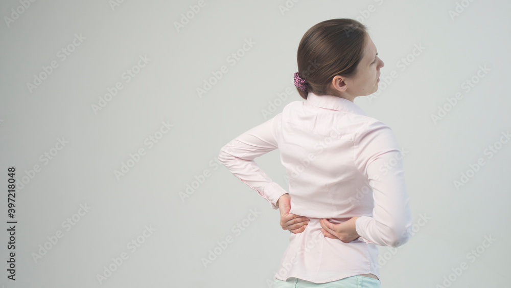 Tired woman feeling pain, massaging tense muscles Tired woman feeling pain, massaging tense muscles