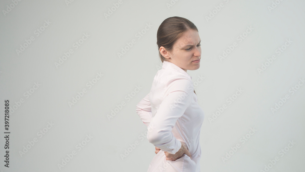 Tired woman feeling pain, massaging tense muscles Tired woman feeling pain, massaging tense muscles