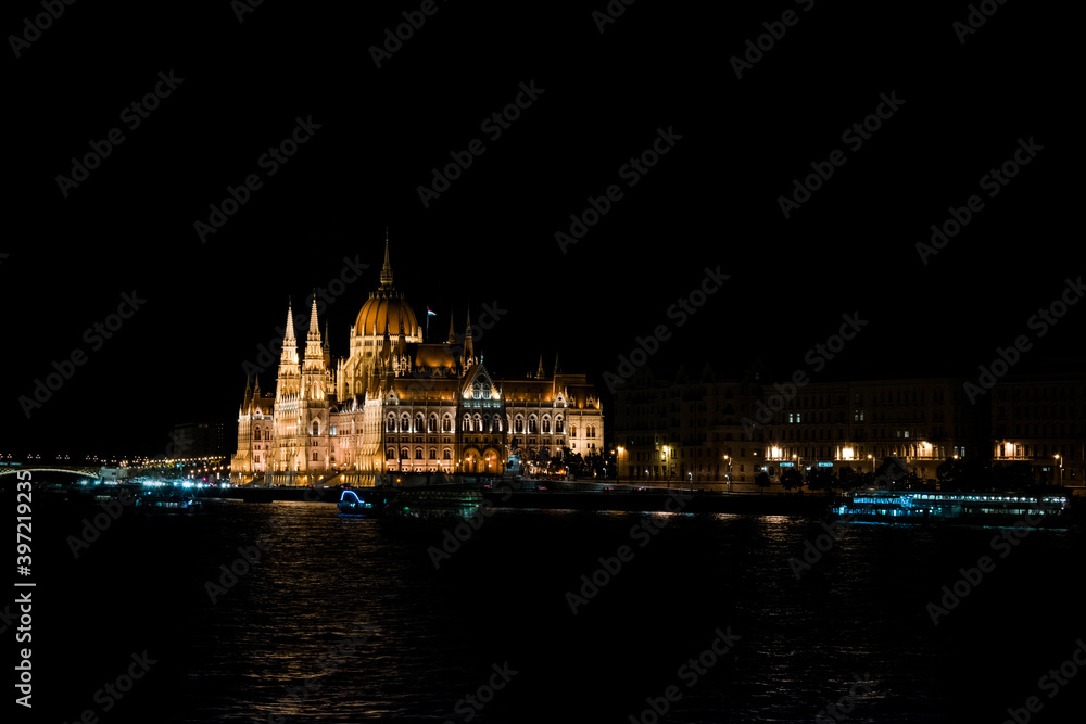 The Hungarian Parliament building illuminated at night. Night landscape of Budapest and Danube River, Hungary