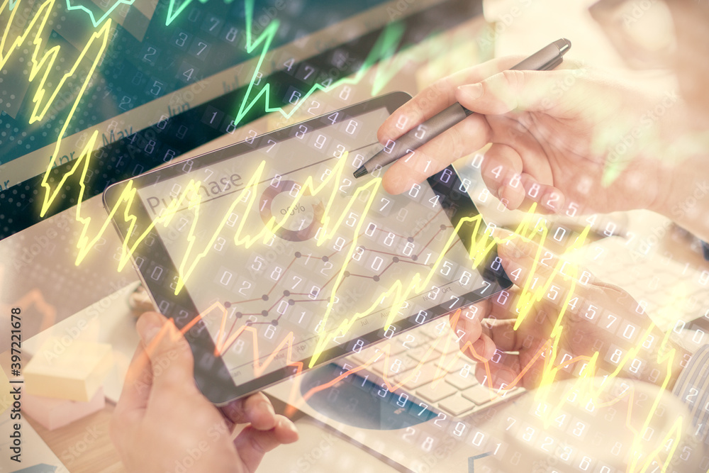 Double exposure of man's hands holding and using a phone and financial chart drawing. Market analysis concept. Double exposure of man's hands holding and using a phone and financial chart drawing. Market analysis concept.