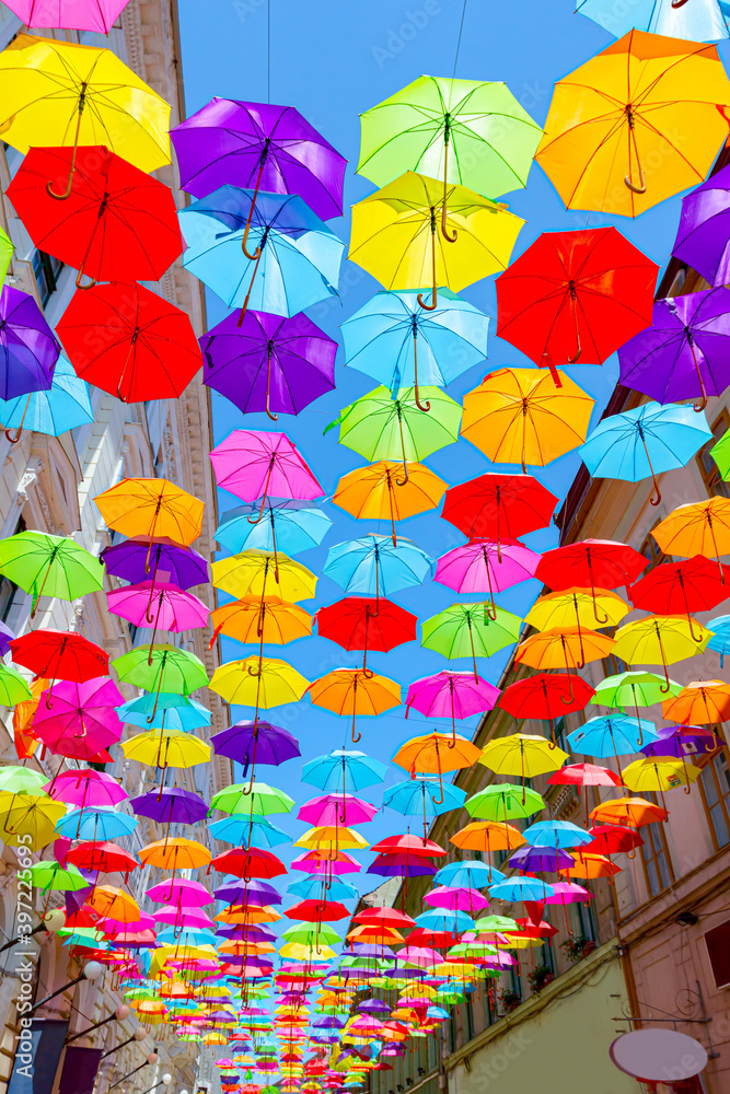 Naklejka premium Decoration with hanging umbrellas