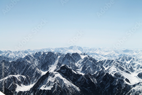 snow covered mountains from the top of Kazbegi