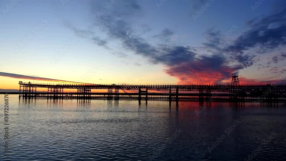 Sunset at Mining pier known as the Tinto Dock at sunset Sunset at Mining pier known as the Tinto Dock at sunset