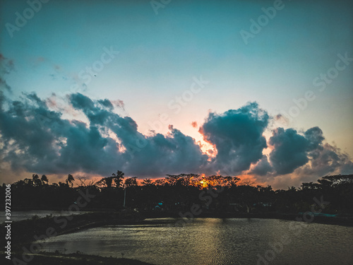 Sunset with cloudy sky