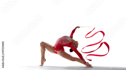 Rhythmic gymnast isoladed on white. photo