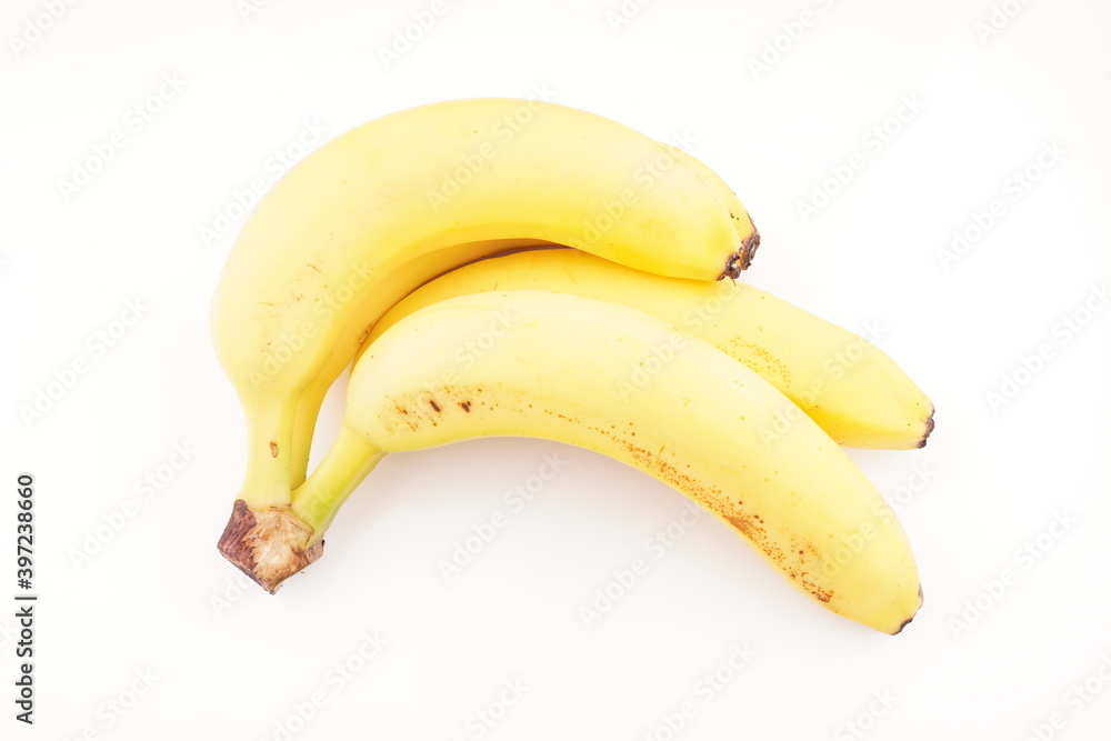 yellow bananas on a white background yellow bananas on a white background