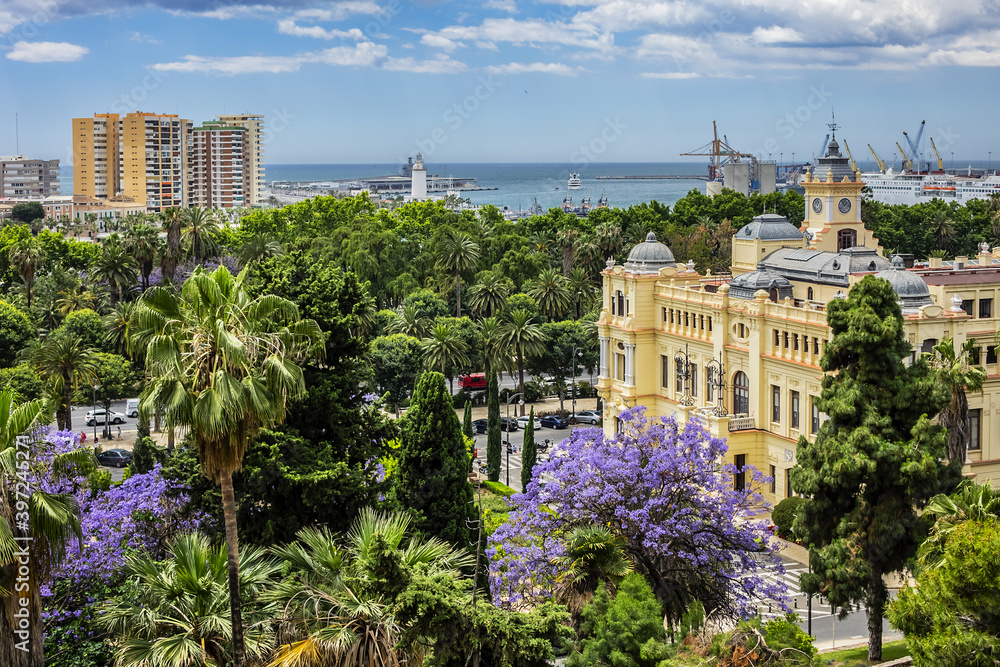 Fototapeta premium Beautiful richly-decorated Neo-baroque style Malaga City Council building. View from Gibralfaro castle. Malaga, Costa del Sol, Andalusia Spain.