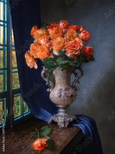 Fotografie Still life with splendid bouquet of  orange roses