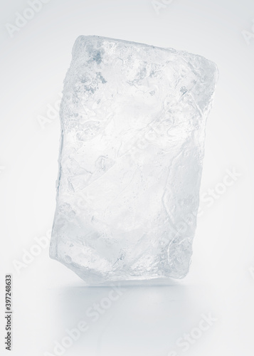 Textured pure rectangular ice block, isolated on white background.