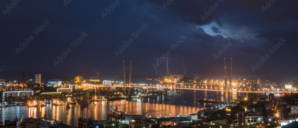 Fototapeta premium Lightning storm over night city.
