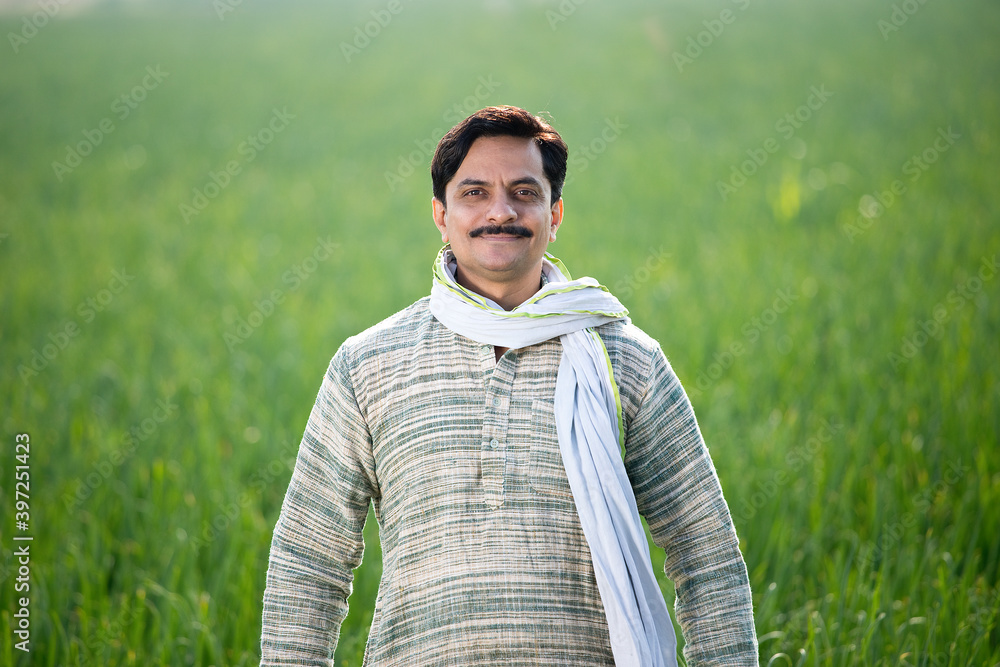Happy Indian farmer in agricultural field outdoor Stock Photo | Adobe Stock