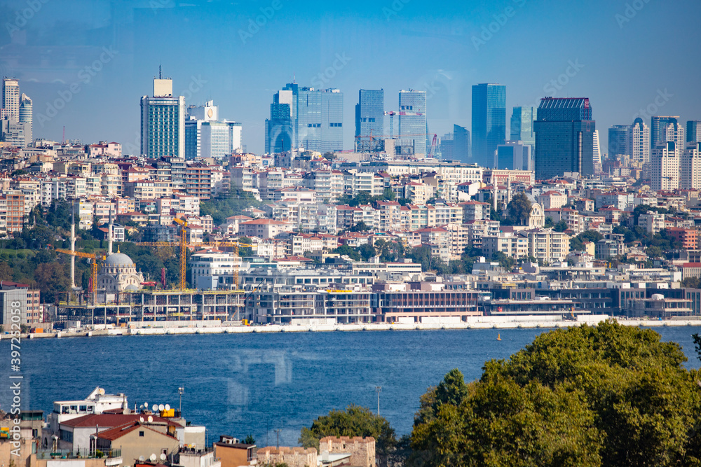Istanbul, Turkey - September 2020: The streets of picturesque Istanbul with urban vistas mixed with historical architecture and recognizable minarets of mosques