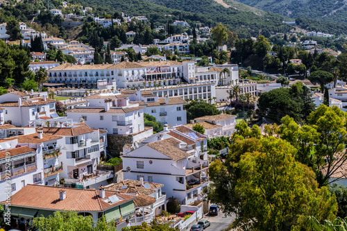 Beautiful aerial view of Mijas - Spanish hill town overlooking the Costa del Sol, not far from Malaga. Mijas known for its white-washed buildings. Mijas, Andalusia, Spain. © dbrnjhrj