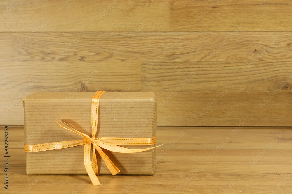 Fototapeta premium Christmas gift box on wooden table