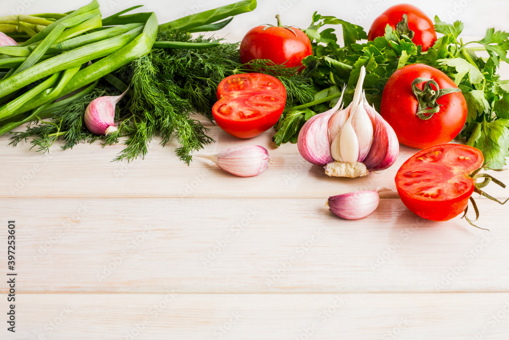 Garlic tomato and herb on the white wooden background Garlic tomato and herb on the white wooden background