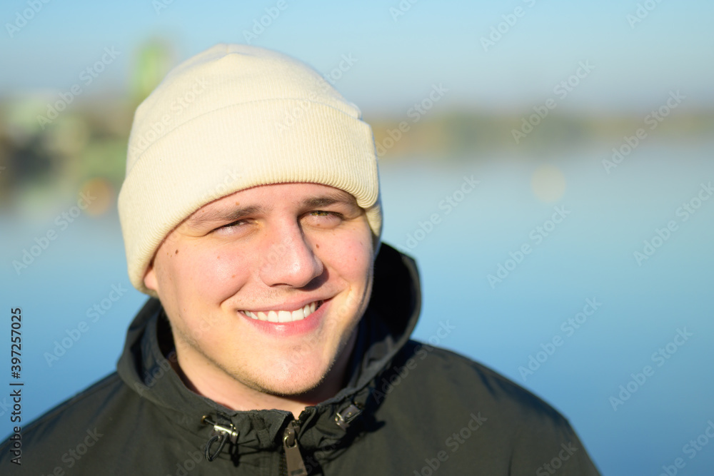 Cheerful young man with a beaming smile Cheerful young man with a beaming smile