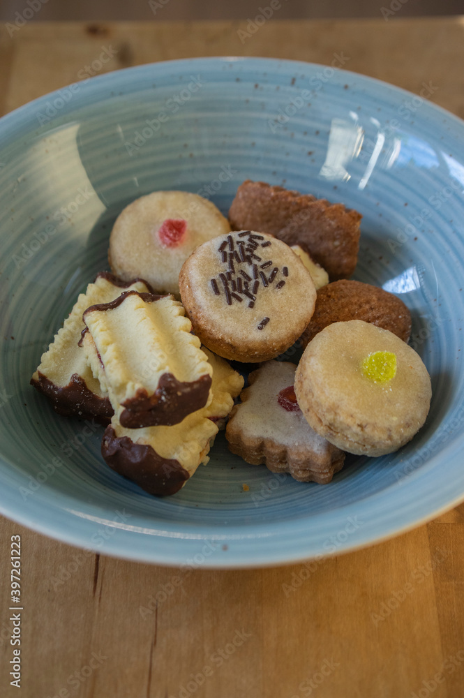 Group of delicious sweet Christmas cookies, white vanilla rolls, gingerbread, linzer and chocolate sweets wiht jam filling Group of delicious sweet Christmas cookies, white vanilla rolls, gingerbread, linzer and chocolate sweets wiht jam filling