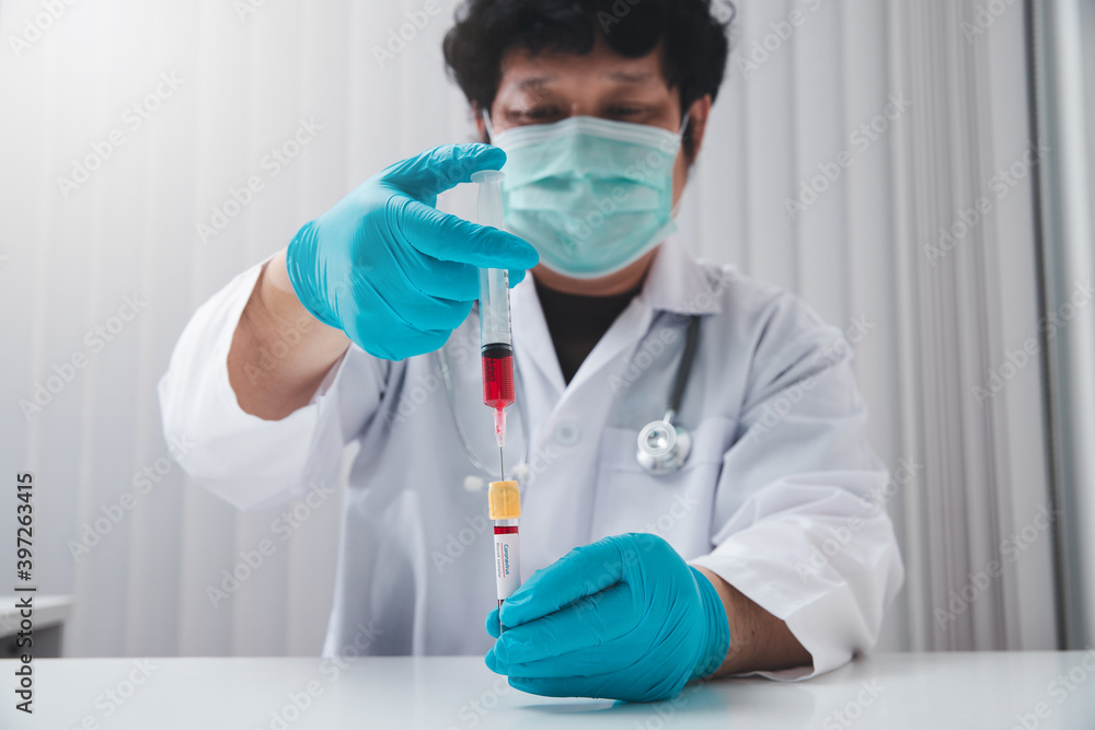 Doctor or Medical staff collect blood samples from patients infected with the coronavirus or COVID-19. for examination in the lab. Pandemic Coronavirus, COVID-19. Doctor or Medical staff collect blood samples from patients infected with the coronavirus or COVID-19. for examination in the lab. Pandemic Coronavirus, COVID-19.
