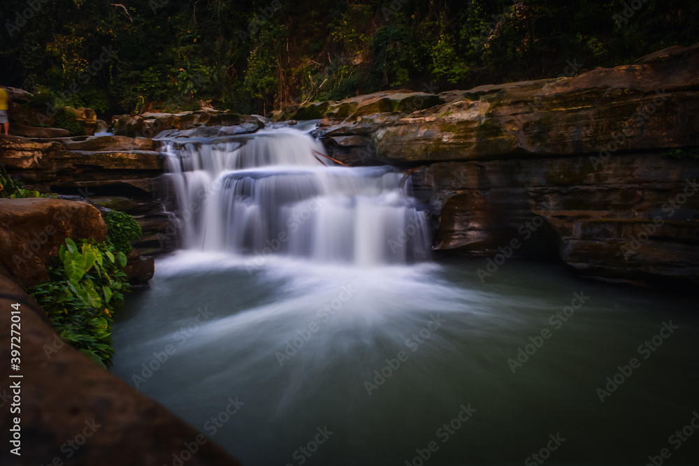 Fototapeta premium The waterfall in the forest beautiful wallpaper backgourn