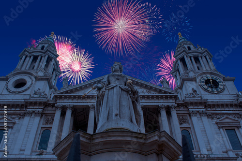 Celebratory fireworks for new year over saint or St paul in london during last night of year. Christmas atmosphere.