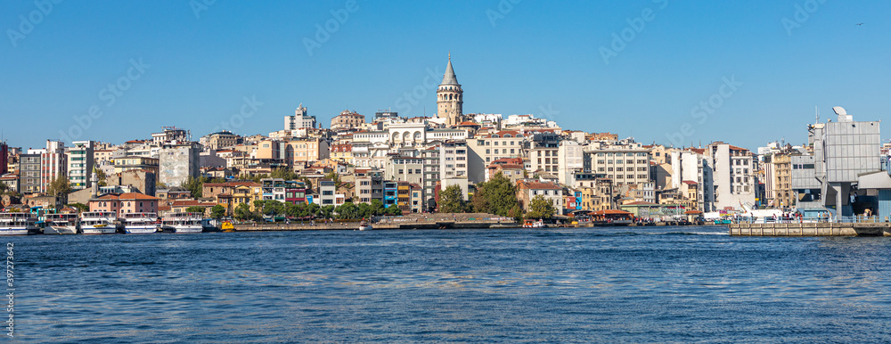 Istanbul, Turkey - September 2020: Panorama with Galata Tower, built in the 14th century by the Genoese colony as part of the defense wall, now touristic attraction and city landmark