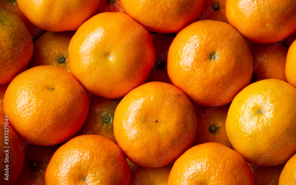 Top view of oranges in basket in supermarket. Top view of oranges in basket in supermarket.