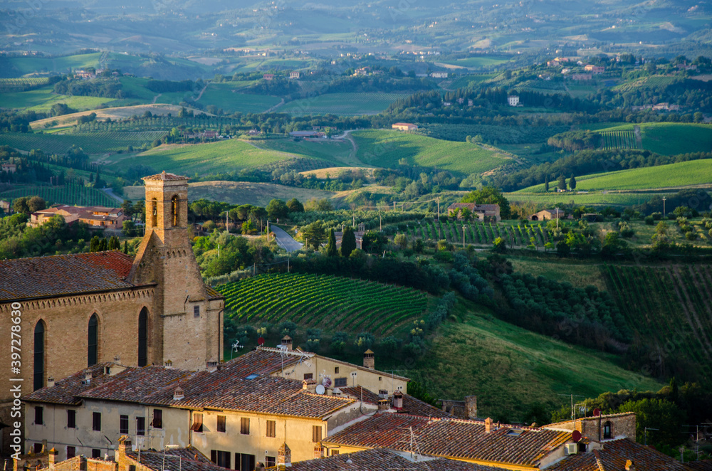 A Tuscan landscape with Sant'Agostino church in San Gimignano, Italy