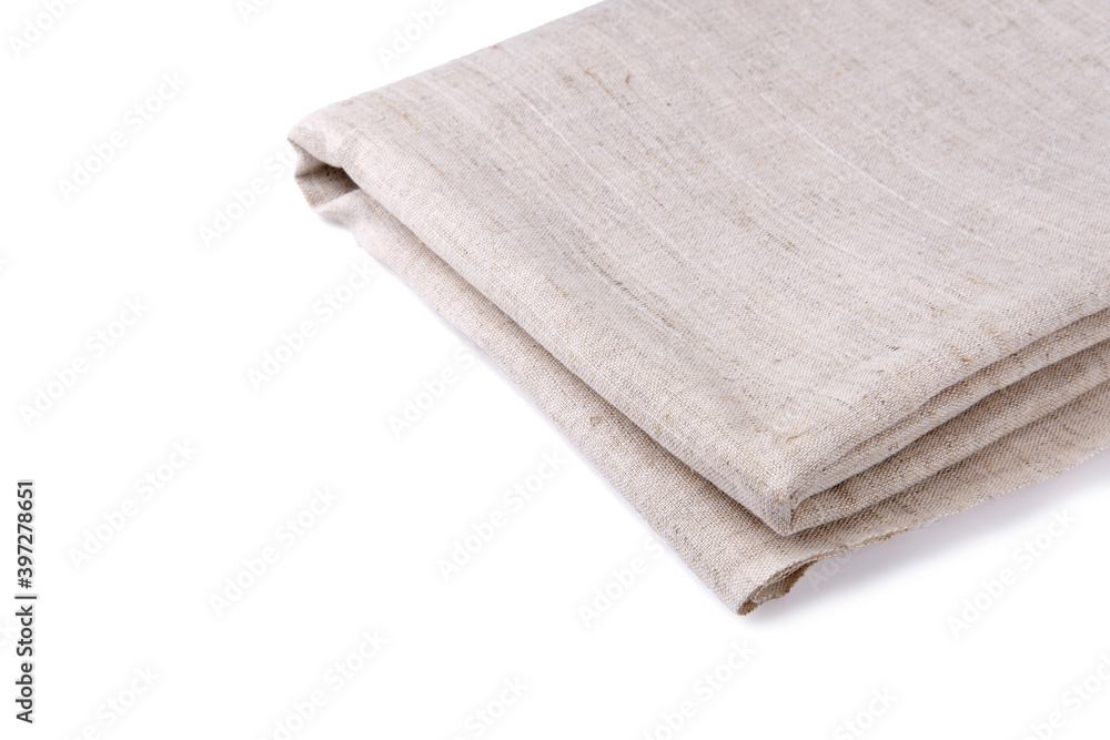 Thick coarse fabric folded isolated on white background. Material for embroidery and making garments. The subject lies diagonally and casts a soft shadow. Thick coarse fabric folded isolated on white background. Material for embroidery and making garments. The subject lies diagonally and casts a soft shadow.