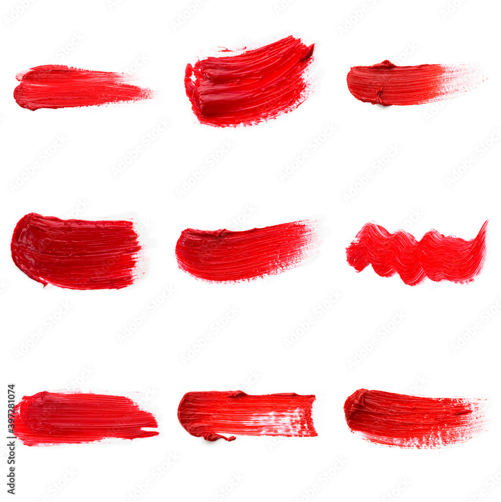 Lipstick smear smudge swatch isolated on white background. Cream makeup texture. Bright red color cosmetic product brush stroke swipe sample Lipstick smear smudge swatch isolated on white background. Cream makeup texture. Bright red color cosmetic product brush stroke swipe sample
