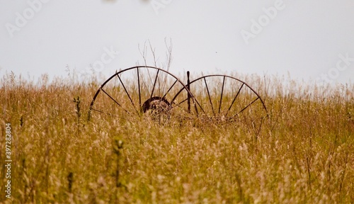 old farm machinery in agricultural field