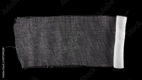 Medical bandage isolated on black background.