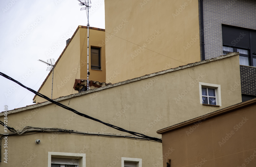 Obraz premium Village house with antennas