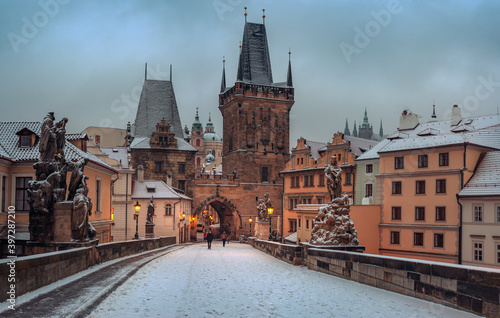 Snowy morning at Charles bridge in winter, Prague, Czech Republic
