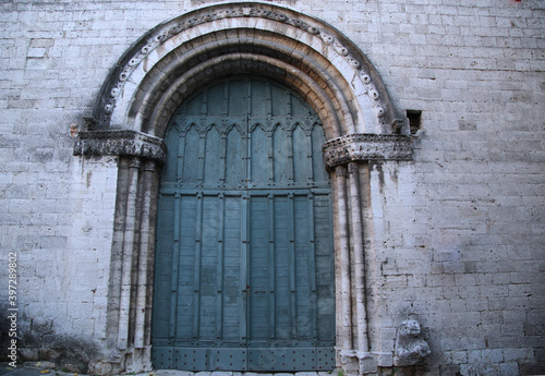 Old door in a building in the city of Narni, Italy