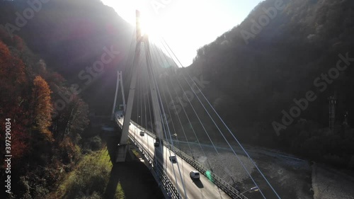 Aerial view of cable stayed bridge. Epic cool flight over bridge. small Traffic on road. 4k.