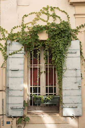 old house with window and shutters, Arles, France photo