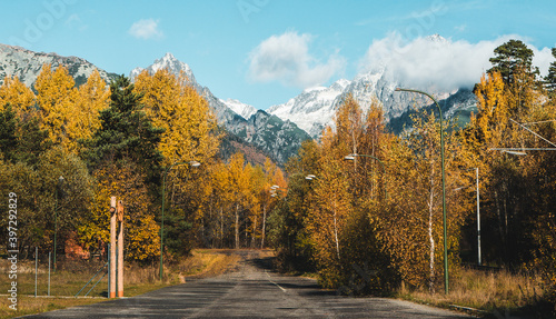 Panoramic shot of autumn mountain landscape during sunset. High Tatras  Slovakia  seen from Poprad