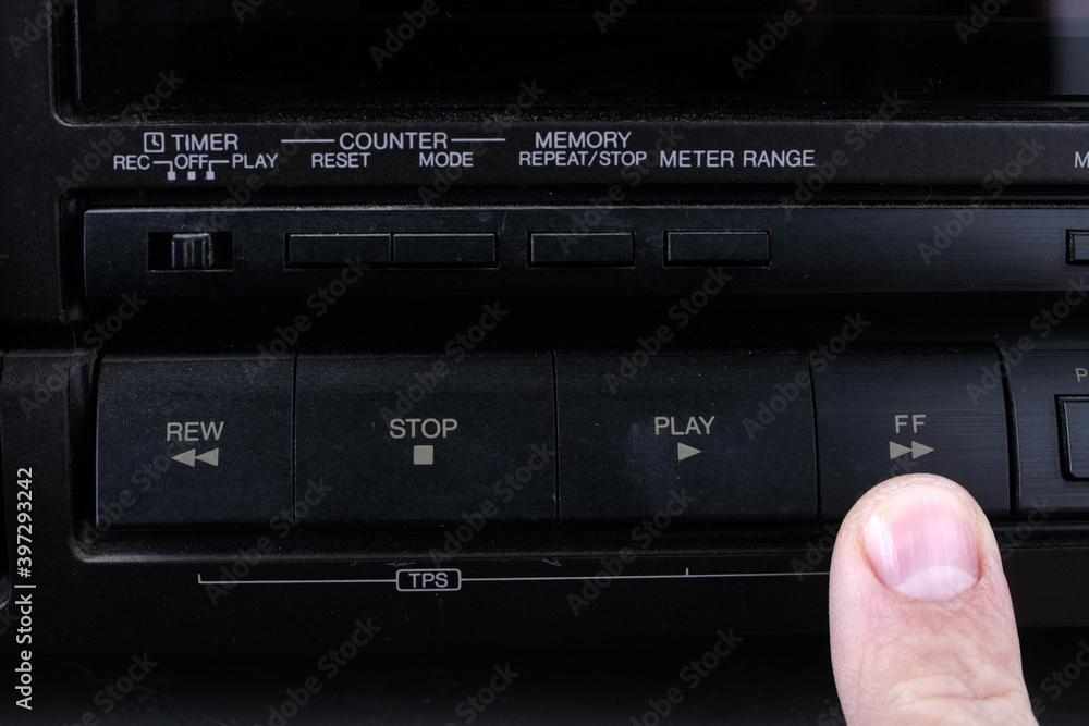Press FF button on retro audio cassette tape recorder. Press FF button on retro audio cassette tape recorder.