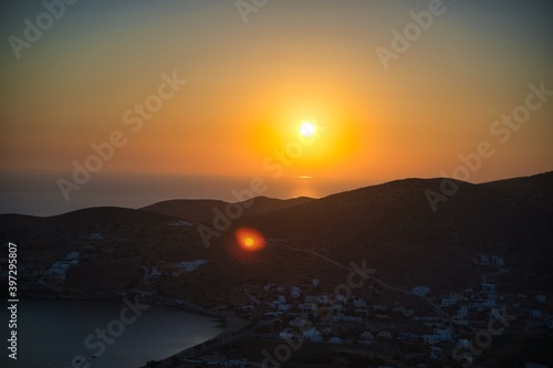 Sunset Ancient castle in the harbor of Chora town Ios Greece