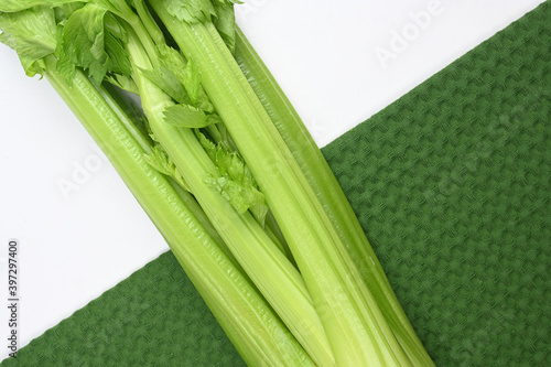 fresh celery organic from natural at on white table