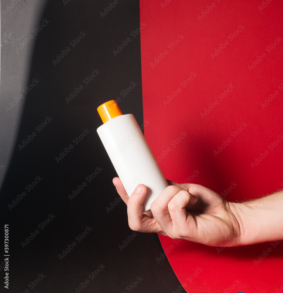 White tube bottle of shampoo, conditioner, hair rinse, mouthwash, on a colored background. White tube bottle of shampoo, conditioner, hair rinse, mouthwash, on a colored background.