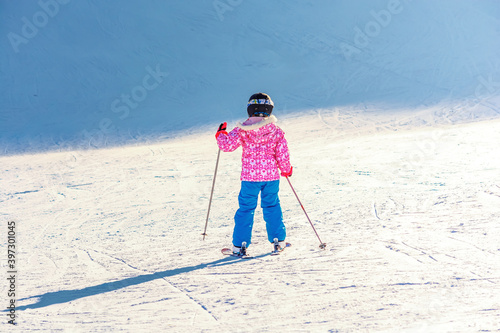 Girl skier Girl skier welcomes athletes on the ski track