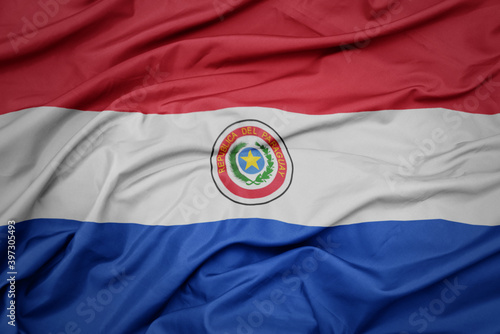 Cuadro en lienzo waving colorful national flag of paraguay.