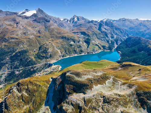 View of mountains and Chevril lake near Tignes Ski Resort, France photo