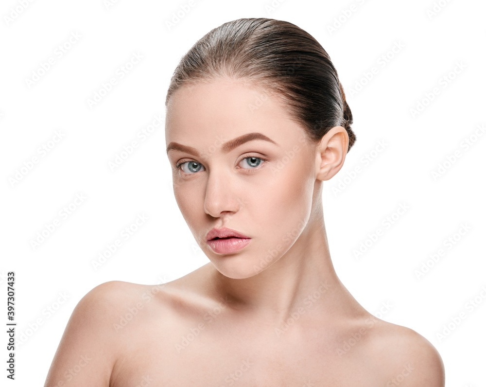 Beautiful young woman with clean fresh facial skin on white Beautiful young woman with clean fresh facial skin on white