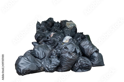 Several black garbage bags come together to form a large pile on white background with clipping path.