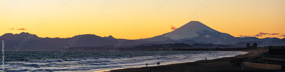 Beautiful Shoreline and Silhouette of Mt. Fuji at Sunset time