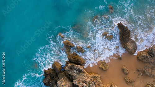 Aerial view of the sand beach of Caños de Meca with blue water. Top view, amazing natural beach background. Atlantic Ocean in Caños de Meca, Cádiz, Andalusia, Spain.