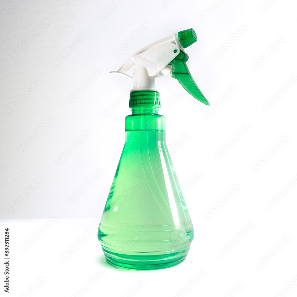 Green spray bottle with white background Green spray bottle with white background